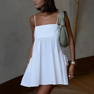 Commense White Babydoll Mini Dress XS Adjustable Tie Back Pockets NWT